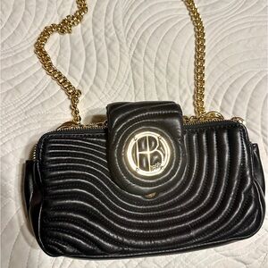 Purse Henri Bendel black. Little lip stick on inside.